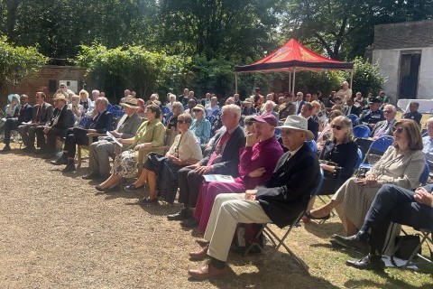 The audience enjoying the performance on a lovely summer's afternoon